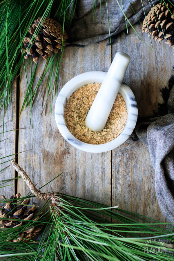 grinding onion soup mix in a mortar and pestle