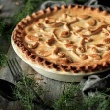 Creamy Chicken and Mushroom Pie: an easy recipe that combines leftover chicken with a flavorful gravy and flaky shortcrust pastry. It’s sure to be the star of your next dinner. | www.savortheflavour.com #comfortfood #chickenpie #familypie #chickenrecipes #mushroom