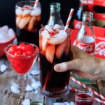 Roy Rogers Mocktail: an easy, non alcoholic recipe that is both fun to make and drink for your children. It only takes 4 ingredients: cola, grenadine, maraschino cherries, and ice. This popular drink is commonly served along side a Shirley Temple to please both the boys and the girls at any party. | www.savortheflavour.com #royrogers #mocktail #coke #grenadine #recipe