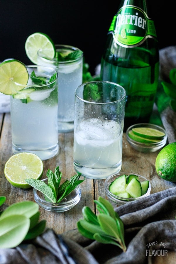 glass filled with lime juice, simple syrup, and ice