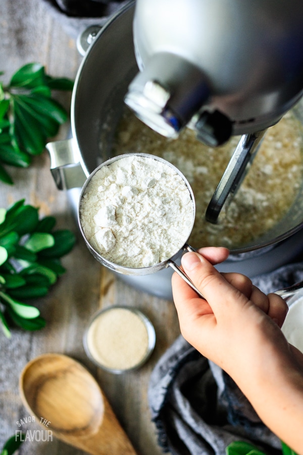 adding flour to mixture for Swedish cardamom buns