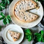 slice of blueberry frangipane tart on a plate