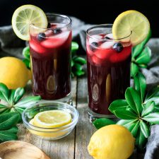 two glasses of blueberry lemonade