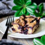 slice of peach and blueberry boy bait with fork