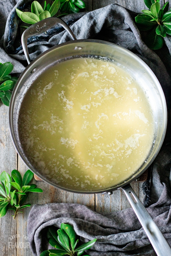 melted butter in a skillet for fried apples