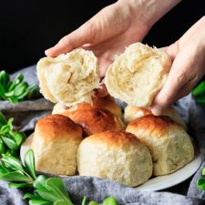 breaking one of the Hokkaido milk bread rolls in half