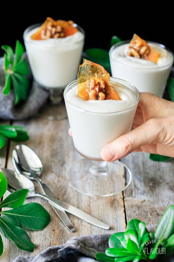 holding a glass of maple mousse