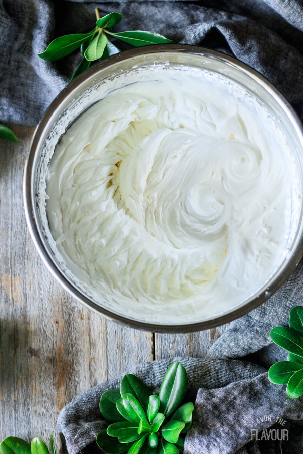 whipped cream in a bowl for maple mousse