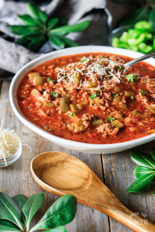 holding a spoonful of stuffed pepper soup