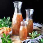 bottles of roasted turkey stock with vegetables