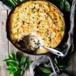 shepherd's pie in a skillet with spoon