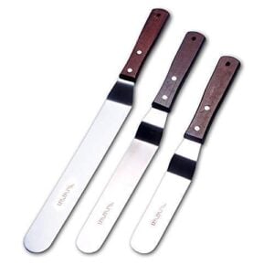 three angled spatulas with wooden handles