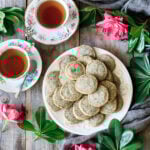 plate of Earl Grey shortbread cookies with two cups of tea