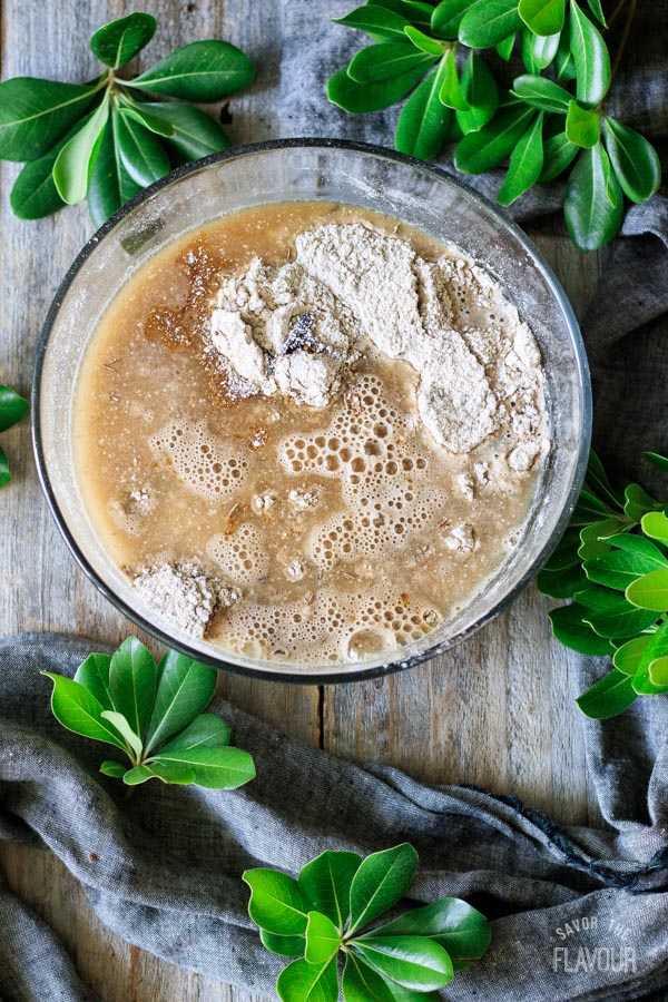 adding molasses and water to flour mixture
