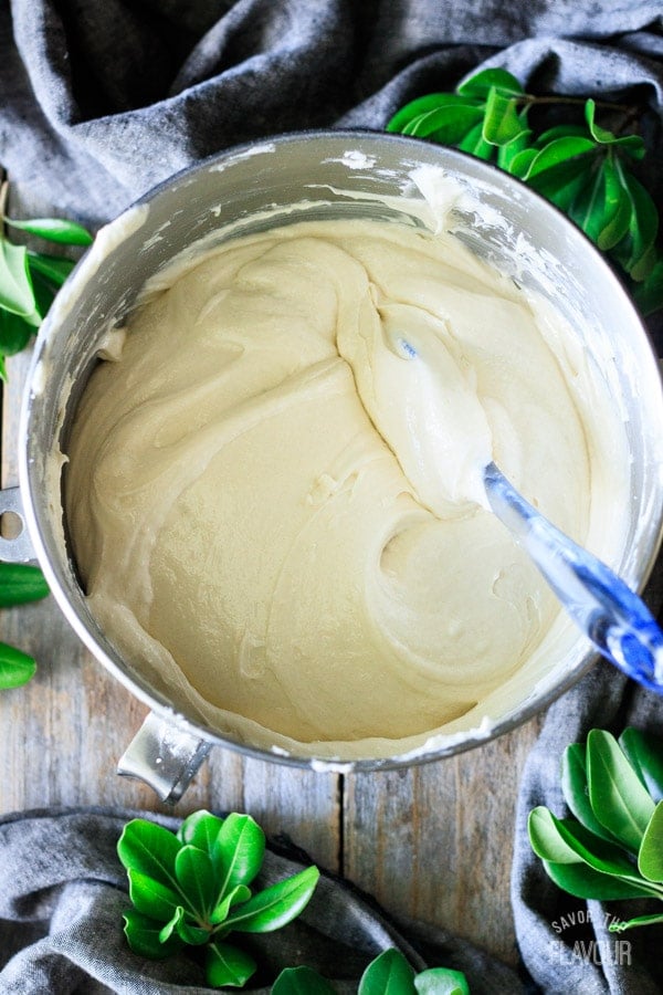 stirring the cake batter with a spatula