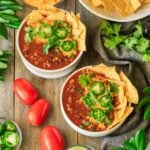 two bowls of taco soup with tomatoes