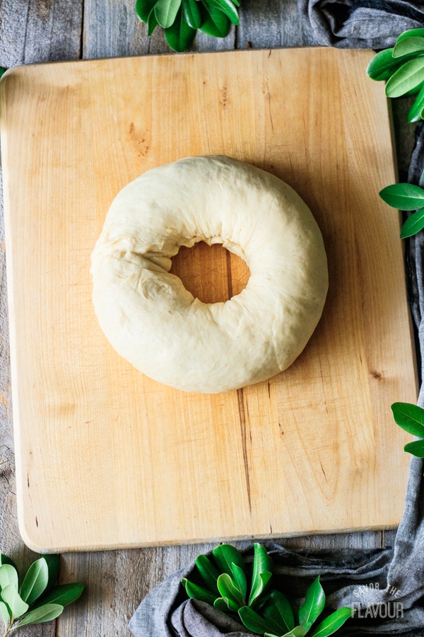 shaping the dough into a circle