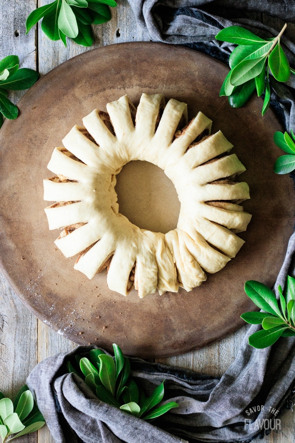 snipping the dough of the Swedish tea ring