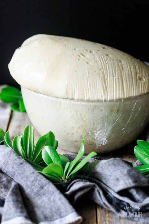 proved bread dough in a bowl