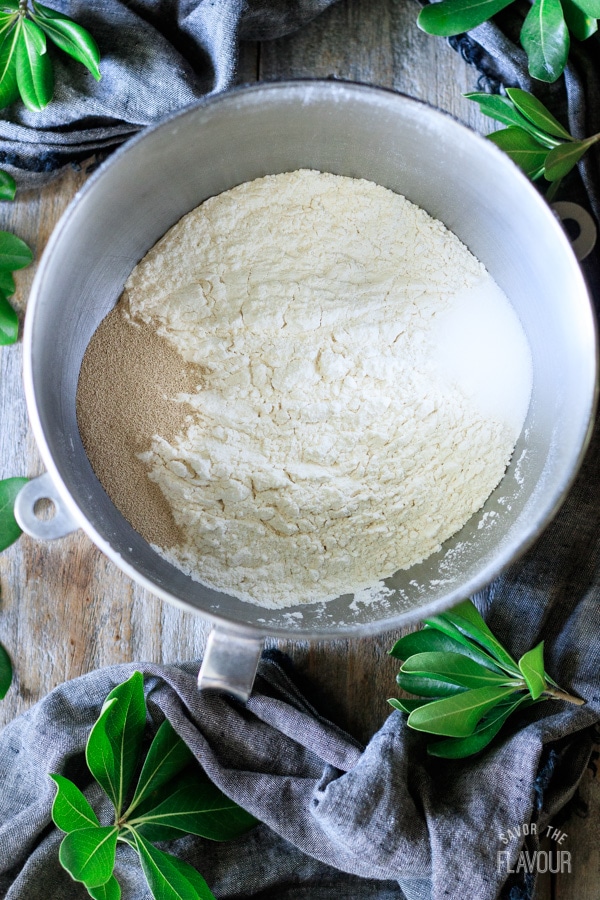 flour, salt, and yeast in a mixing bowl