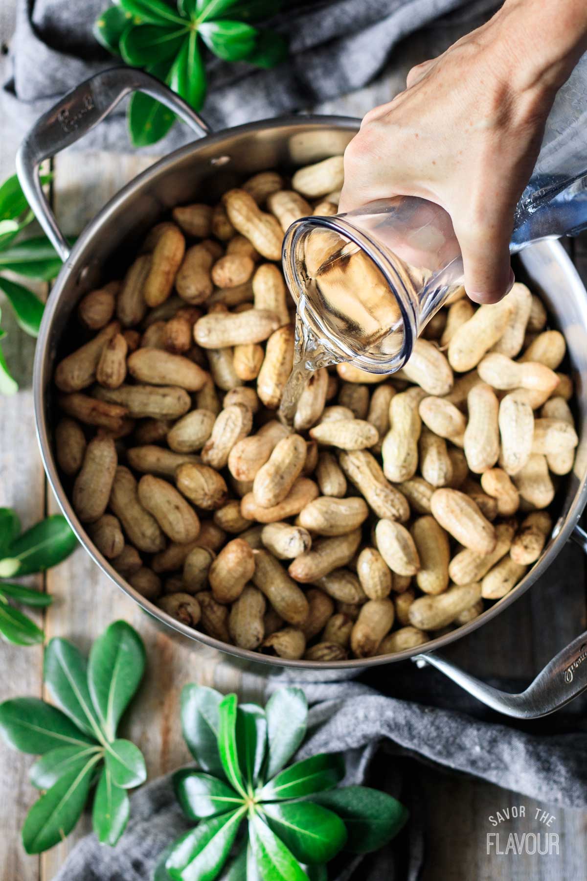how to prevent boiled peanuts from sticking in the shell 8 pouring water into a pot of raw peanuts