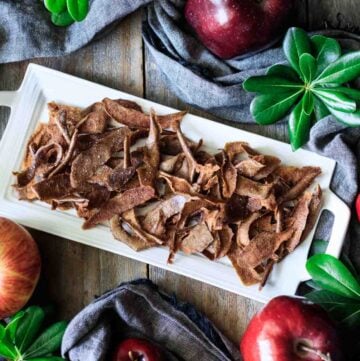 plate of apple peel chips with apples