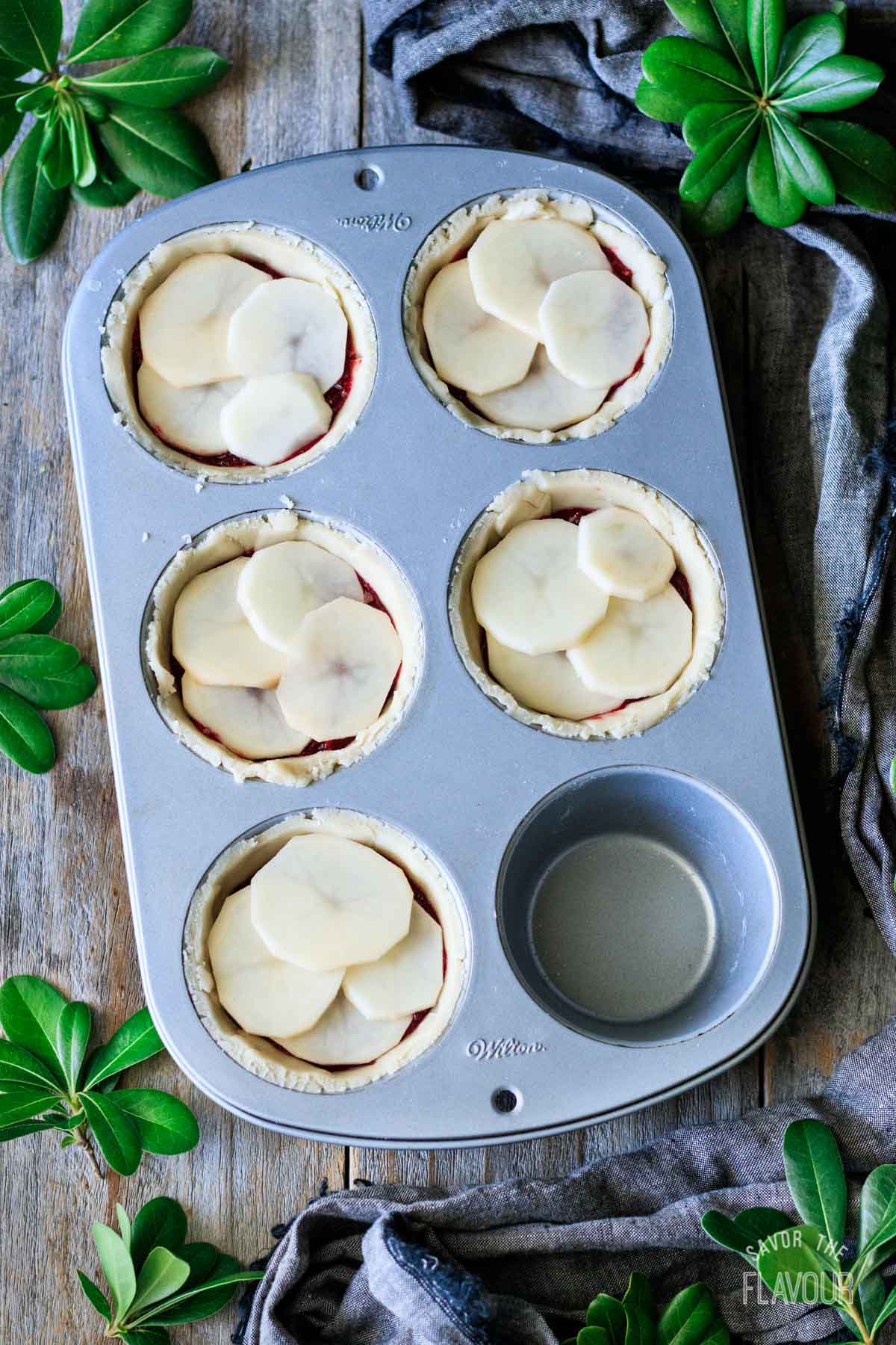 turkey cranberry pies with second potato slice layer