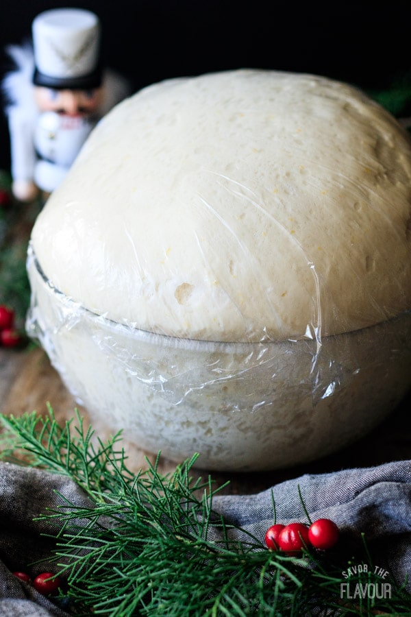 proved stollen dough in a glass bowl