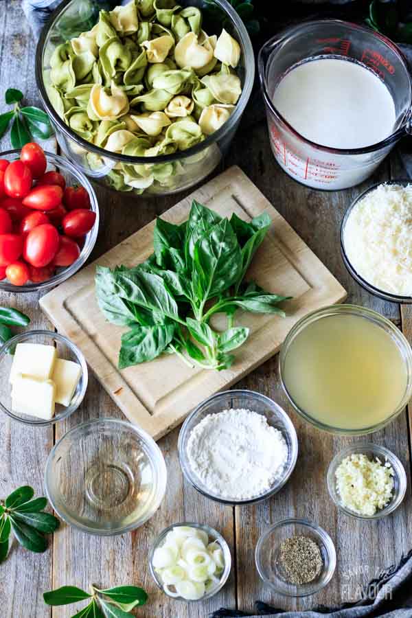 bowls of ingredients for alfredo basil sauce