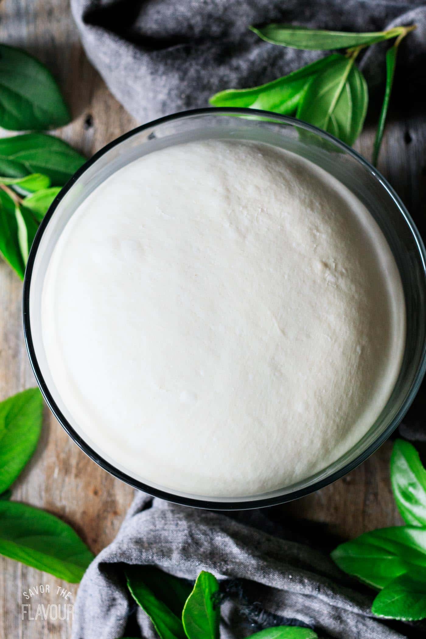 proved telera dough in a glass bowl