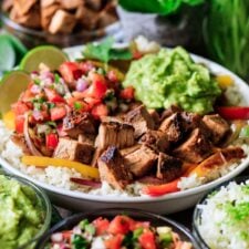 closeup of Chipotle steak with pico de gallo, rice, and guac