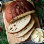 sliced julekake on a cutting board