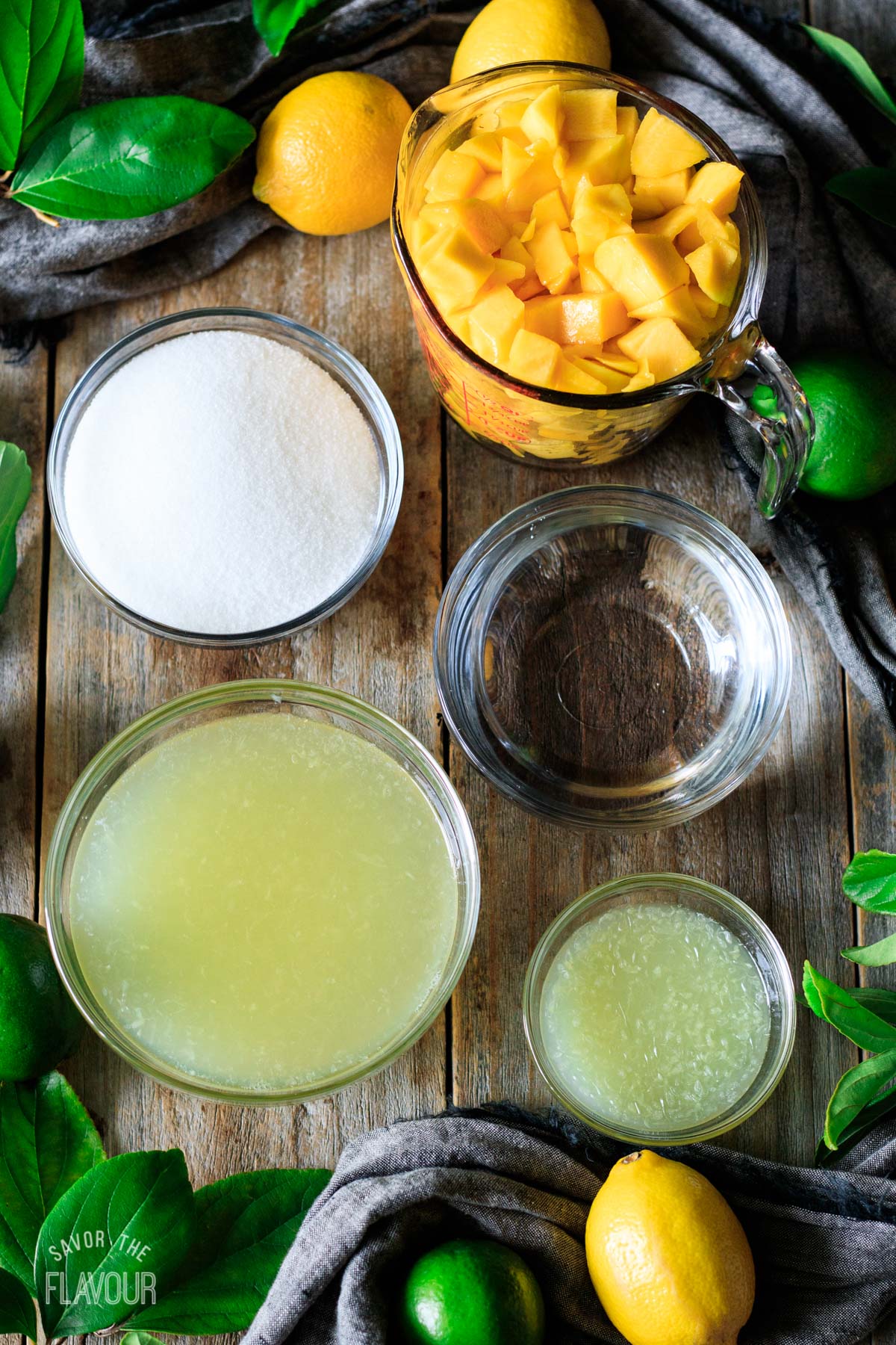 bowls of ingredients for mango lemonade