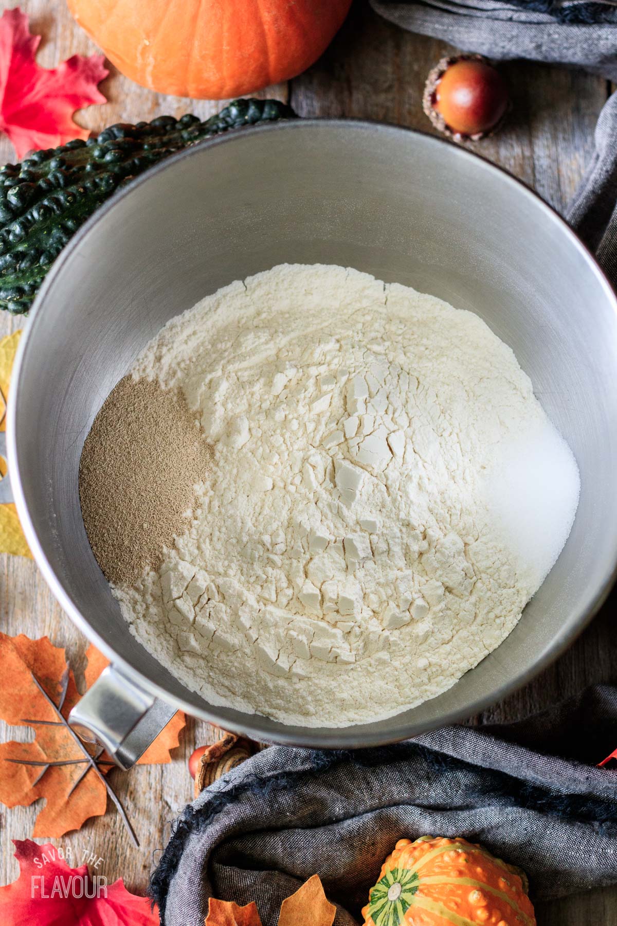 mixing bowl of flour with salt and yeast