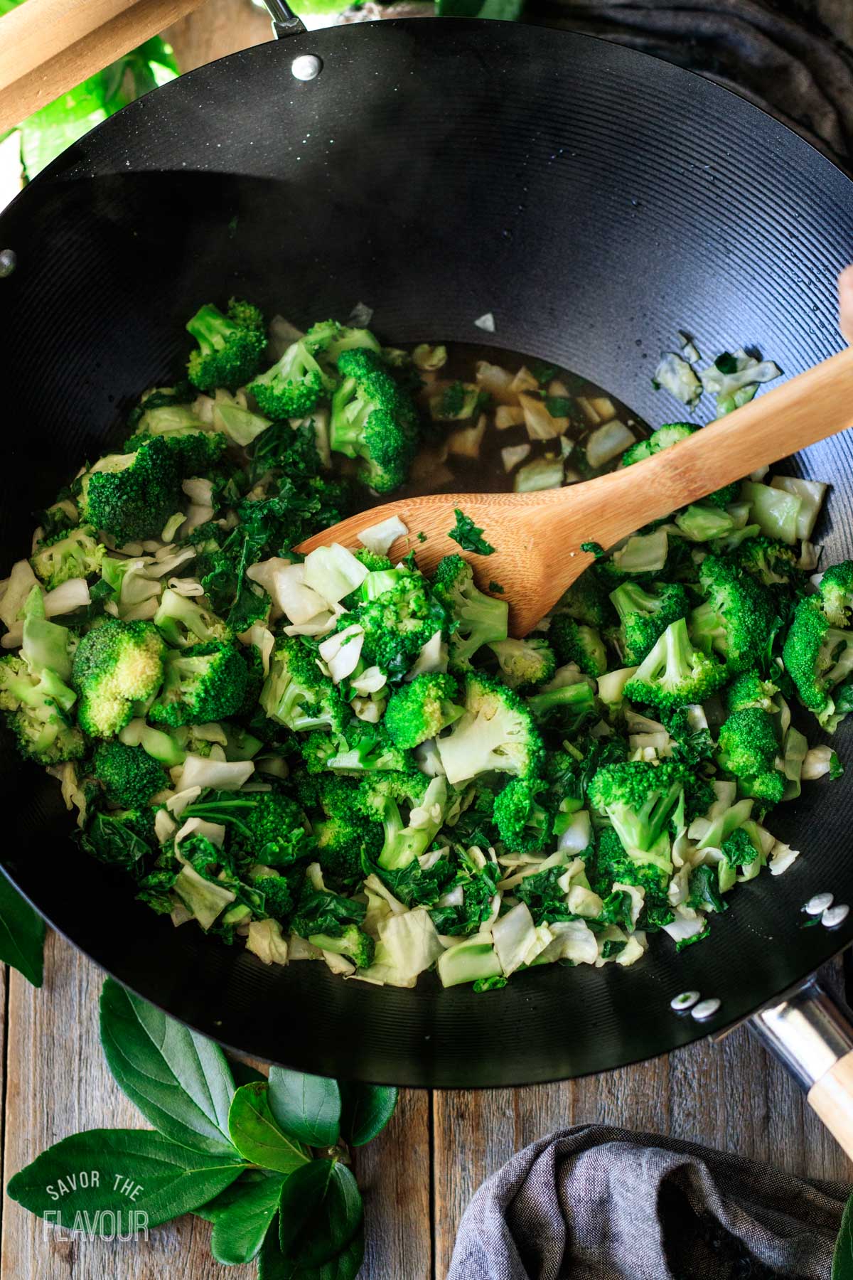cooked vegetable mixture in a large wok