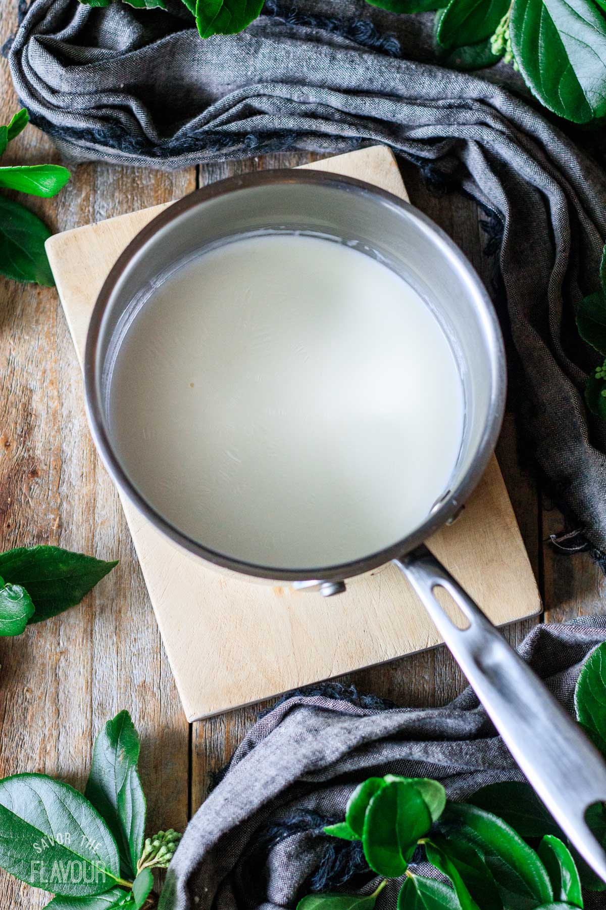 hot cream in a saucepan