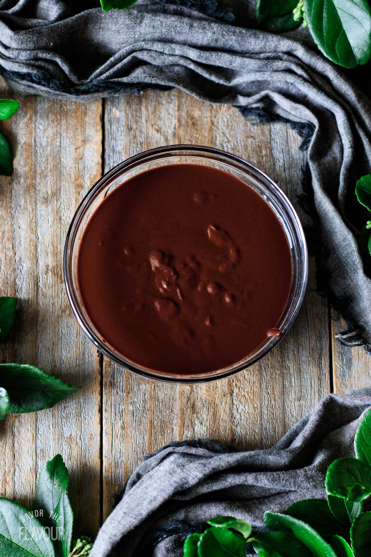 chocolate and raspberry ganache in a glass bowl