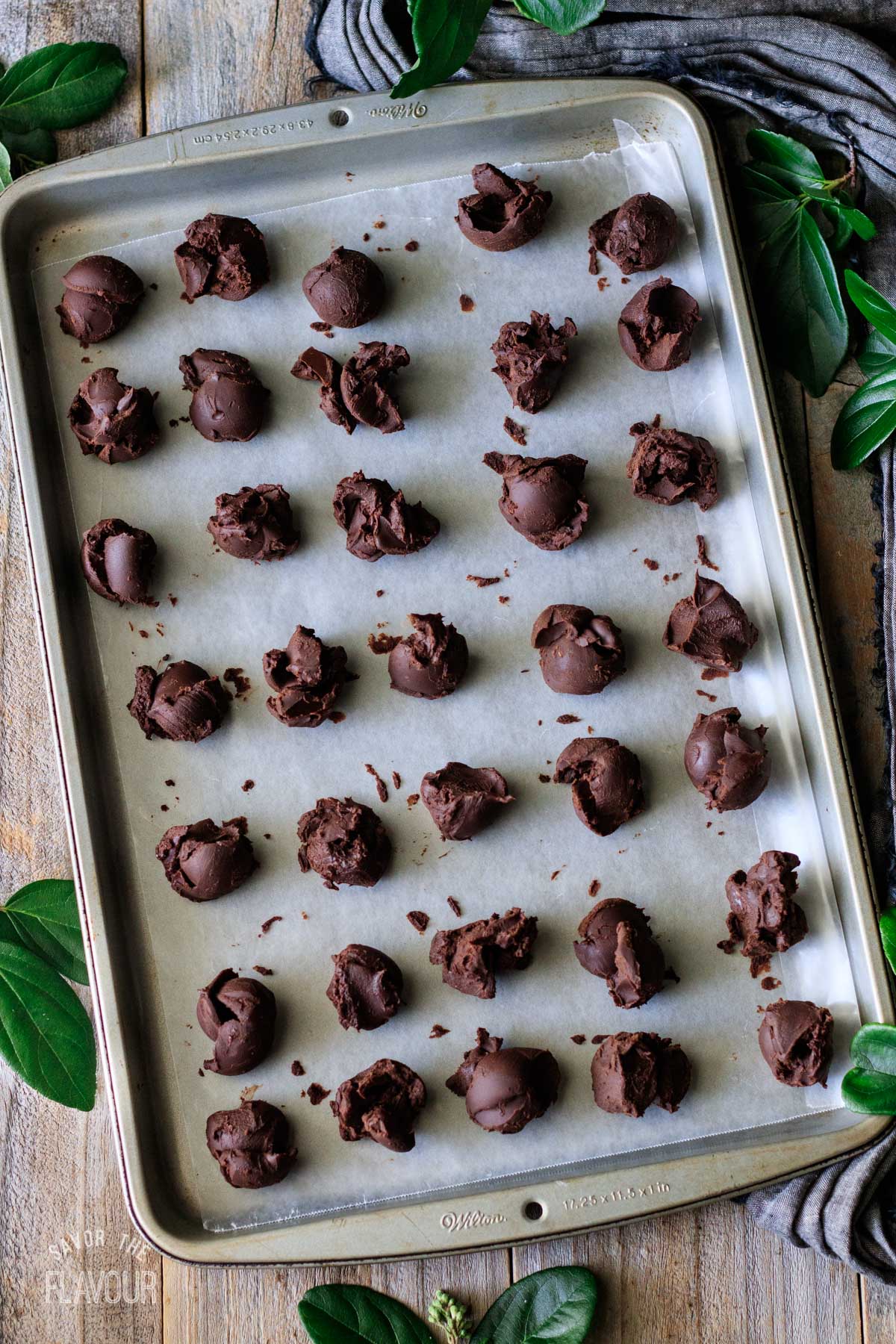 ganache balls on a cookie sheet