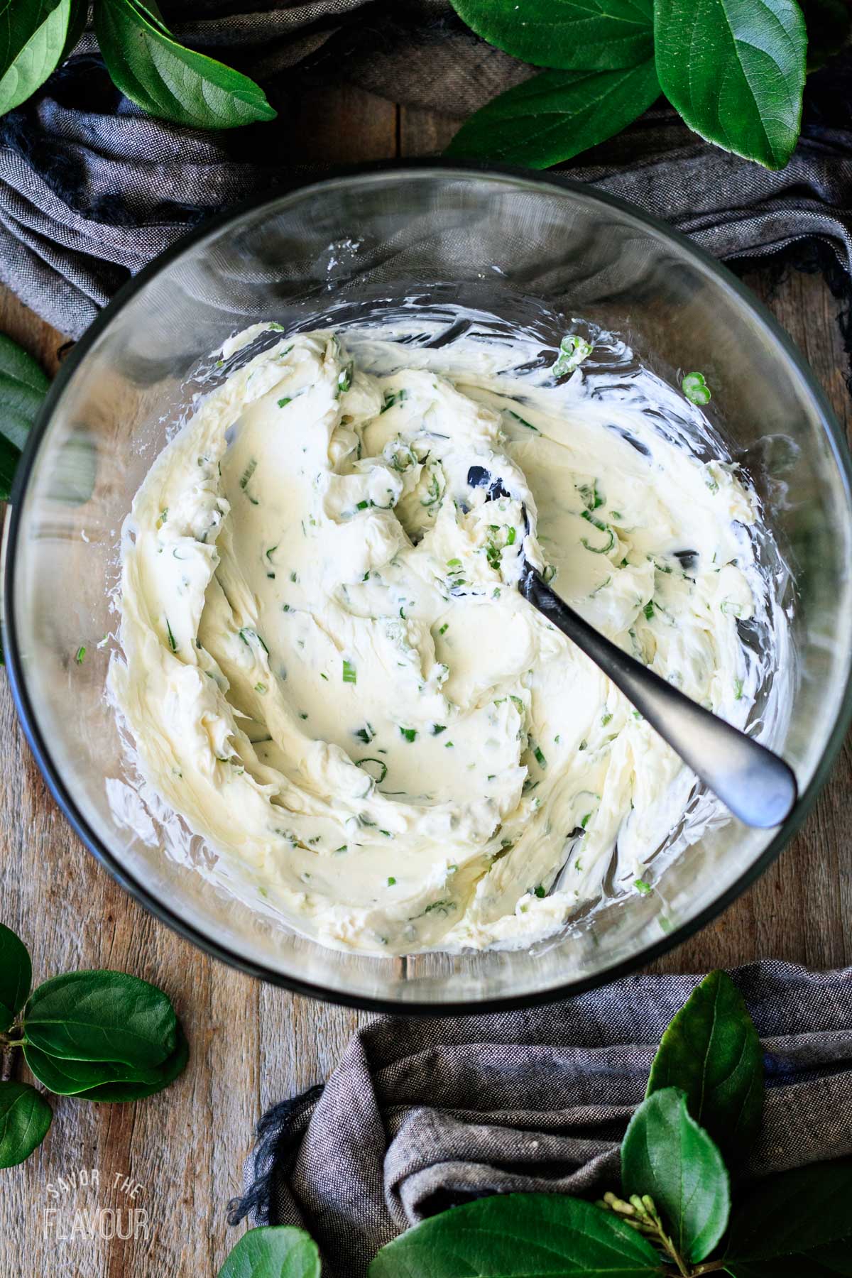 cream cheese filling mixed up in a glass bowl