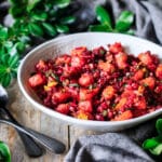 white bowl of pecan orange cranberry relish