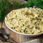 bowl of colcannon with two black spoons