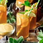 three glasses of Arnold Palmer with a bowl of lemon slices
