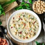 bowl of clam chowder with spoons