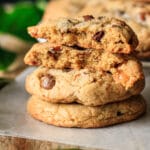 stack of baked kitchen sink cookies on wax paper