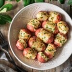 bowl of buttery garlic parsley potatoes