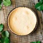 blind baked pastry case in a tart pan