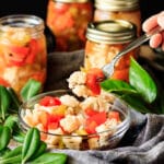 person holding a forkful of giardiniera