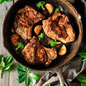 pork chops in a cast iron skillet