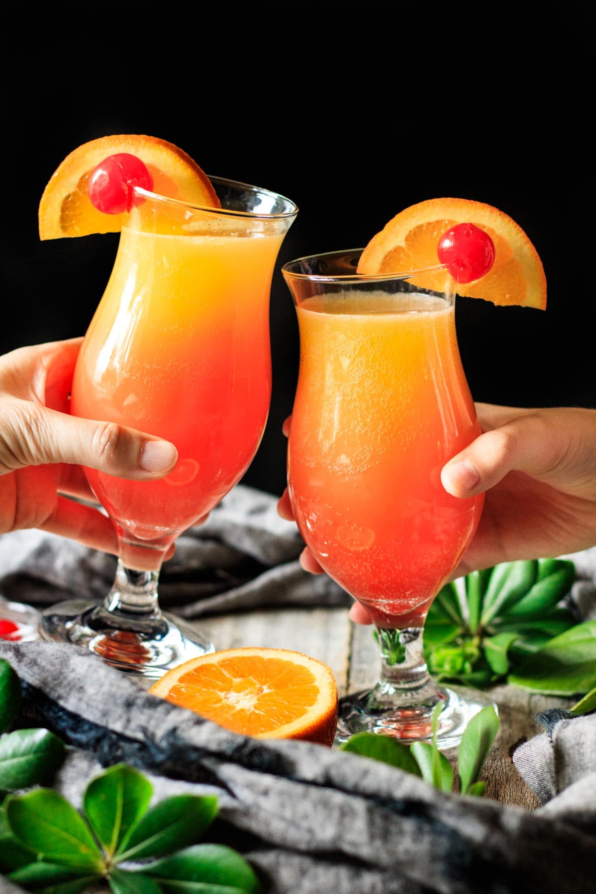 https://savortheflavour.com/wp-content/uploads/2022/05/Tequila-Sunrise-Mocktail-Finals-1200-2.jpg