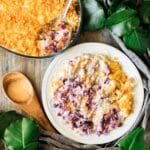plate of cabbage casserole with a wooden spoon